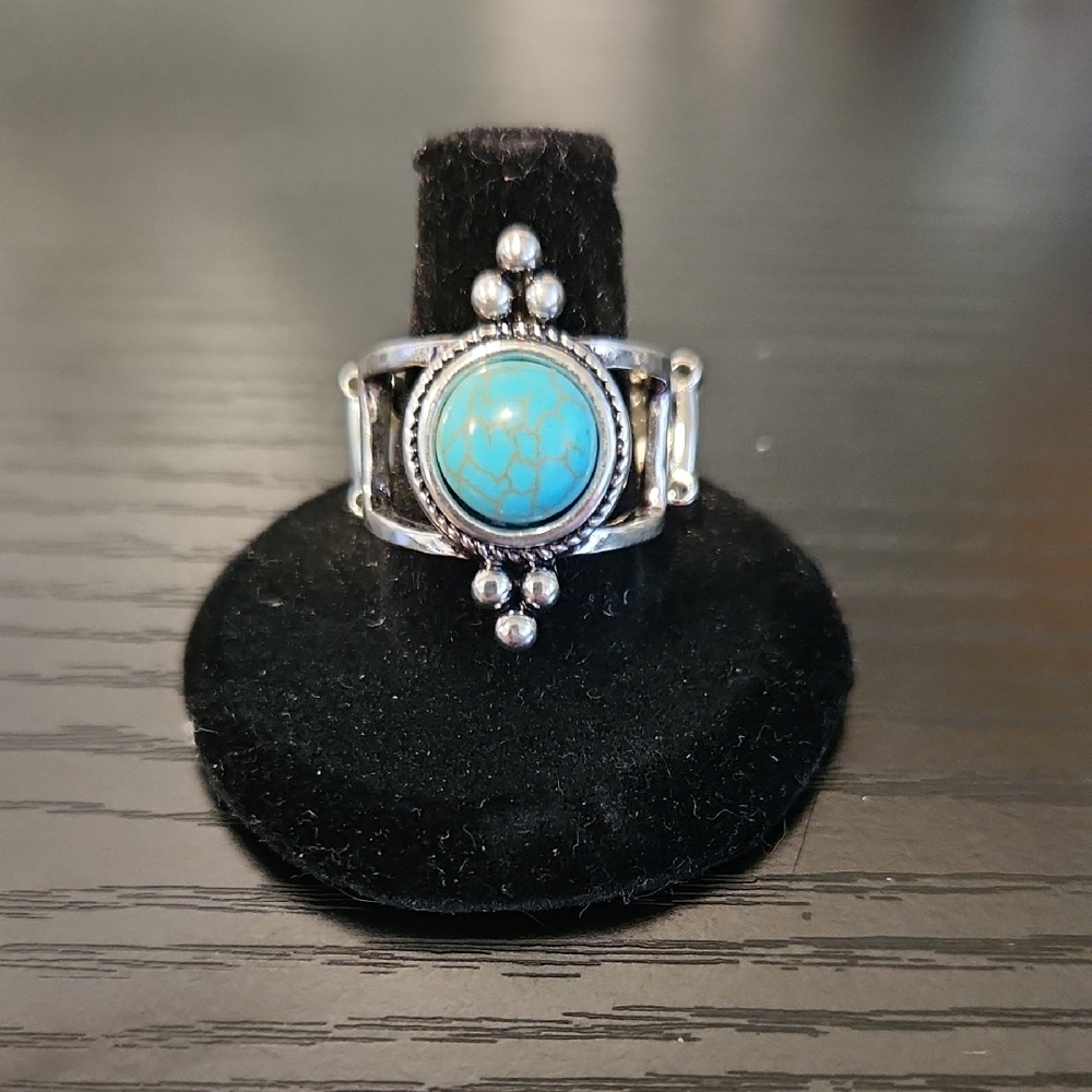 Silver and Blue Statement Ring with Intricate Design